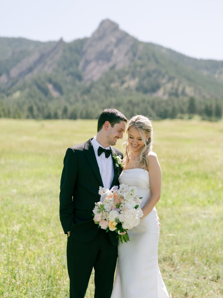 Couple portrait at Chautauqua Park with Flatirons
