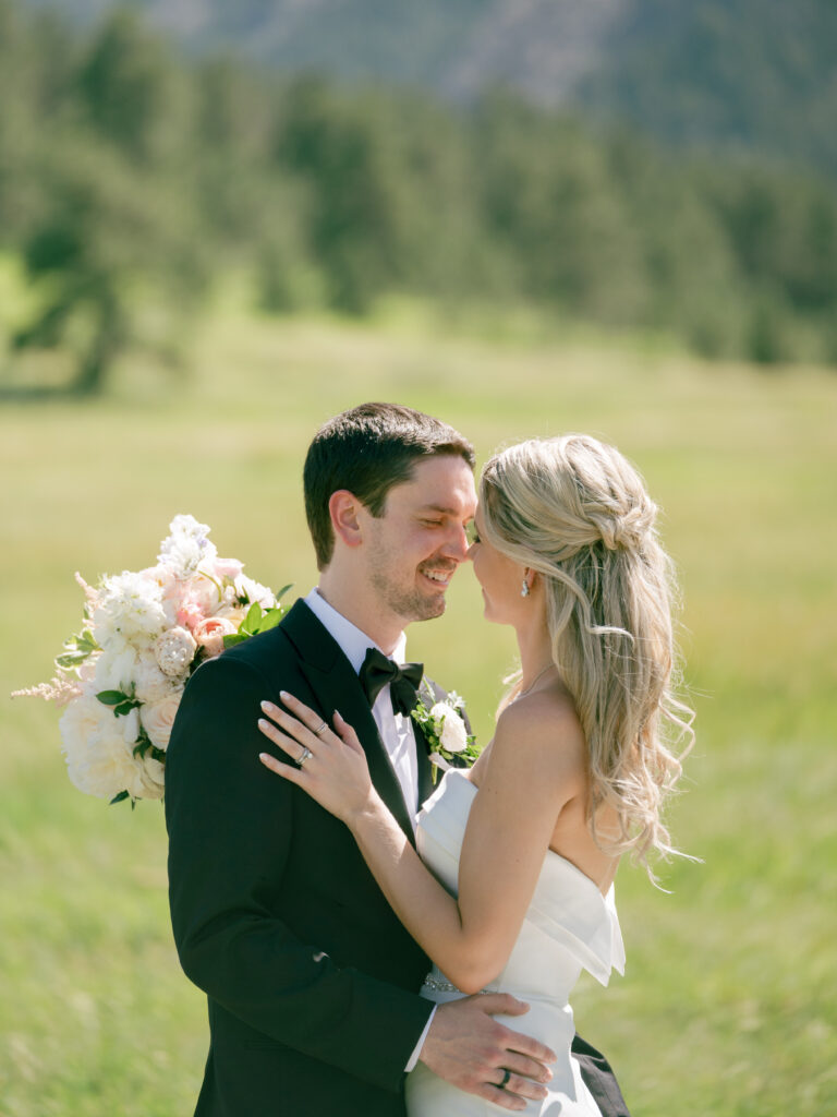 Couple portrait at Chautauqua Park with Flatirons