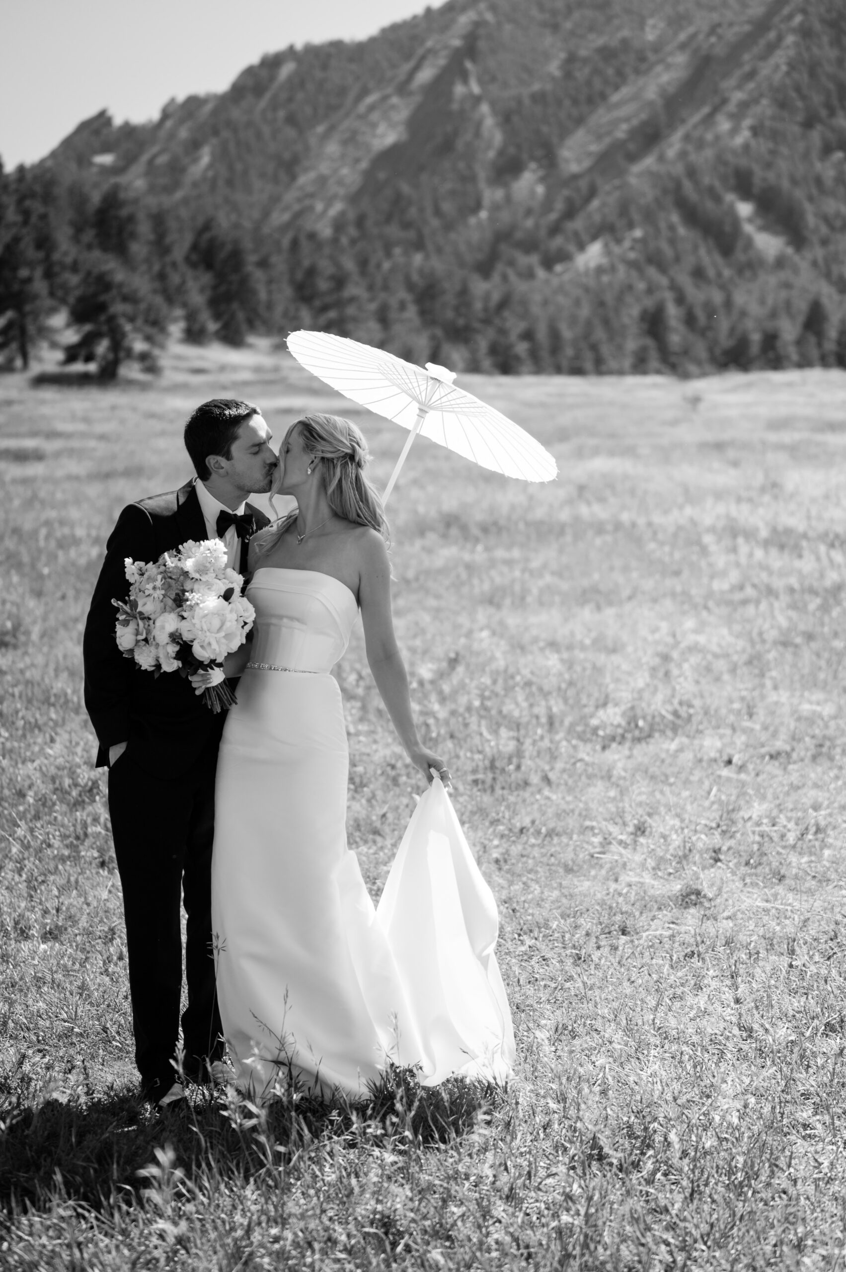 Couple portrait at Chautauqua Park with Flatirons